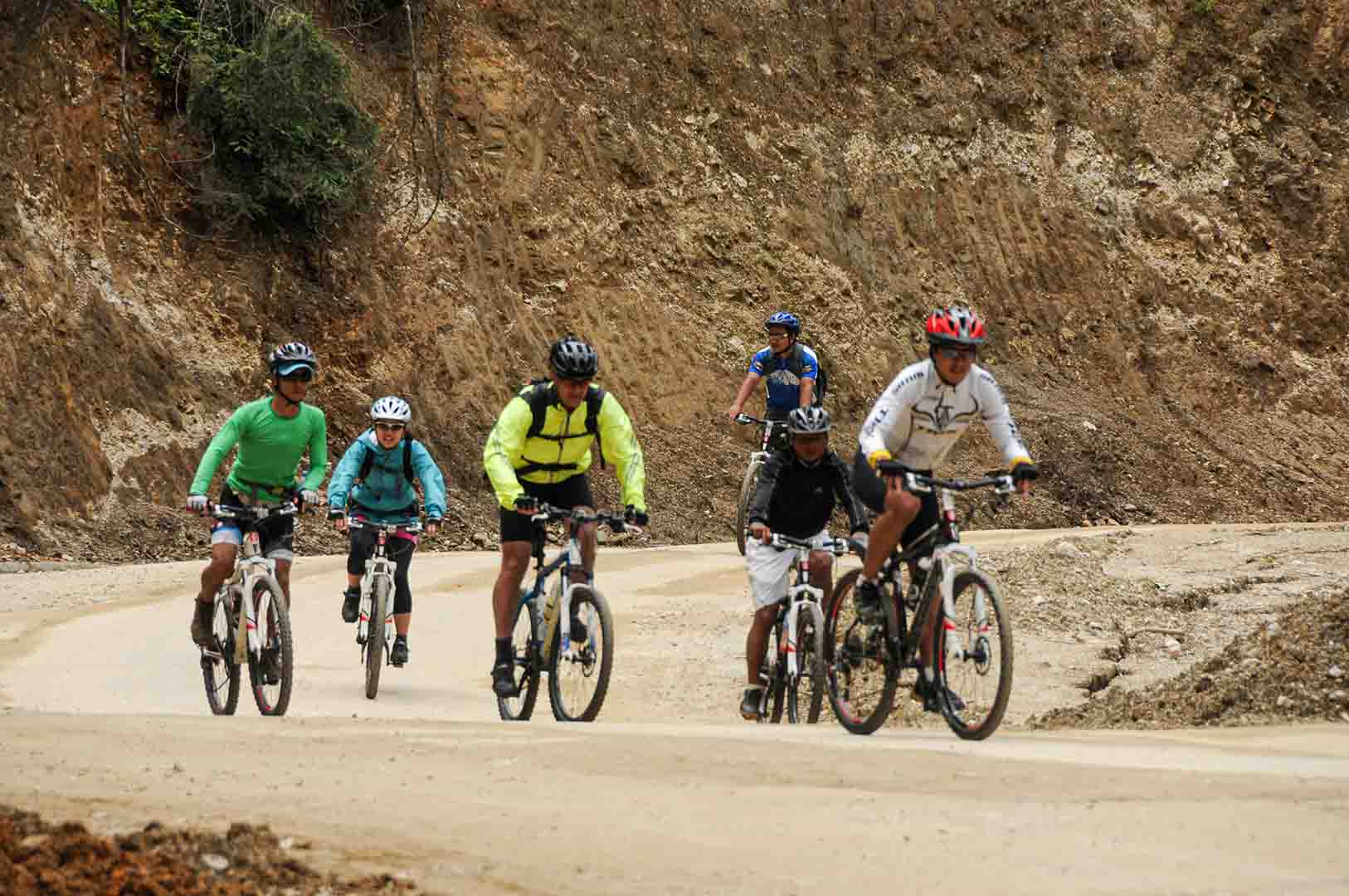 A cycle race in Bhutan, famously known as the Tour of the Dragon