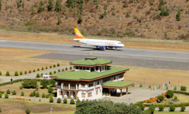 arriving at Paro international airport for Tangsibi Mani Festival