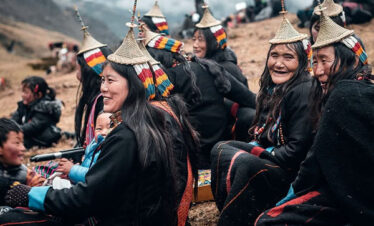 Local women gather during Royal Highlander Festival of Laya