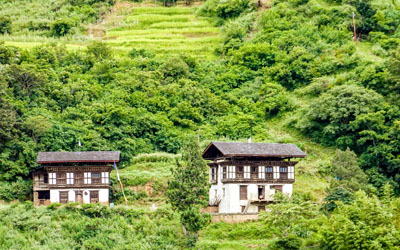 Bhutanese traditional house in the remote area in Paro