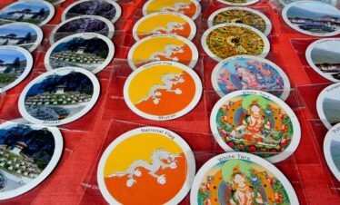 Photos of Bhutanese souvenirs taken at close range.