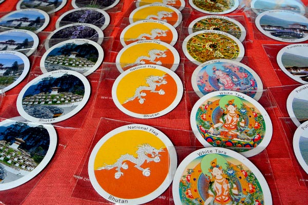 Photos of Bhutanese souvenirs taken at close range.