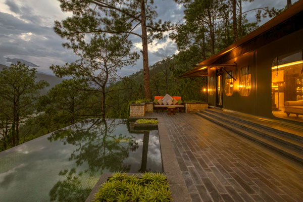 Luxury tented villa suite backyard with swimming pool