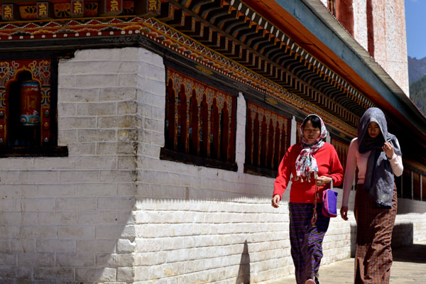 Travel to Bhutan from Sweden. Locals Circumambulating lhakhang in Thimphu