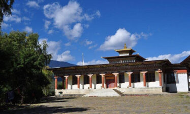 visiting Kenchosum Lhakhang for Bhutan Pilgrimage tour