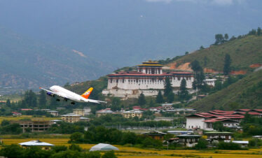 Take off flight with views of Taa Dzong