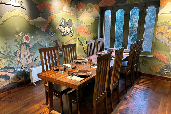 Dining room with paintings