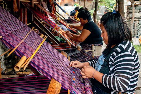 Beautiful Ladies in Khoma Village weaving Kishuthara